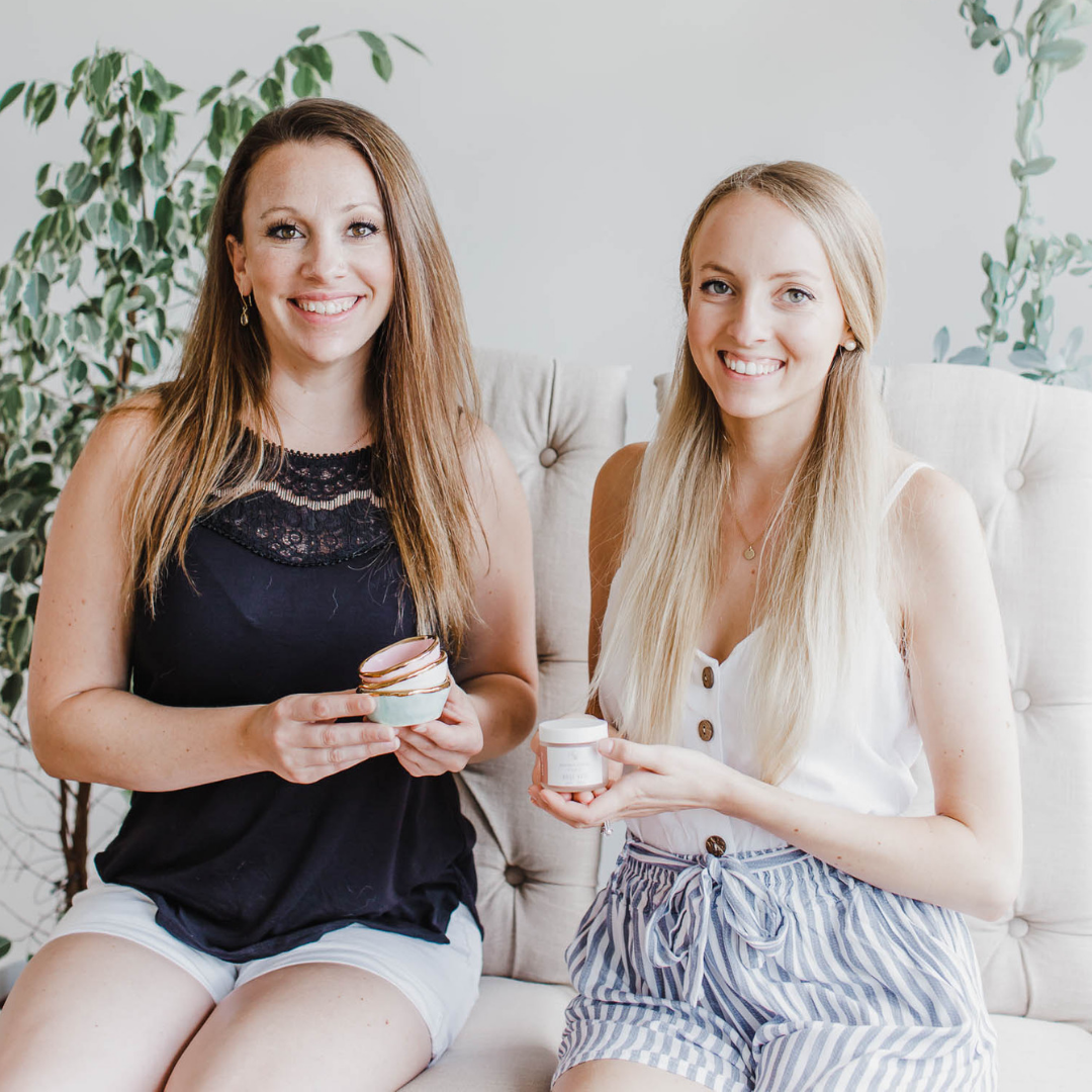 anna and her sister holding all natural skincare products